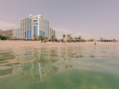 Fujairah, United Arab Emirates - 18th November, 2021 : Beautiful view of the Le Meridien Al Aqah beach resort, luxurious five-star property, from the beach.