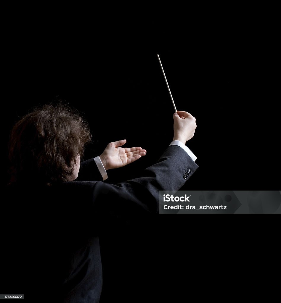 Musical Conductor Conductor's hands with a baton Musical Conductor Stock Photo