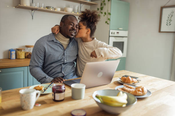 istock Father and daughter having breakfast at home 1756040618