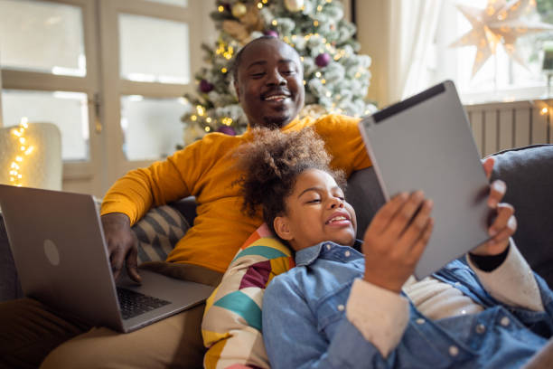 istock Father and daughter spending Christmas together 1756044247