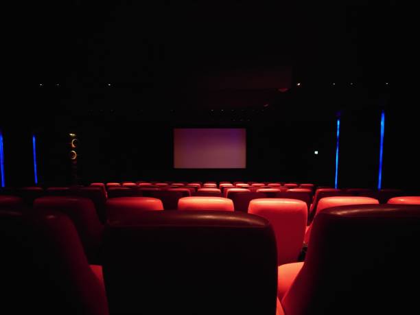 istock empty seats are set up for a movie in the dark 1756058881