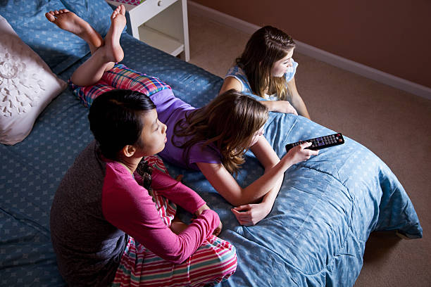 istock Tween girls watching TV 175607240