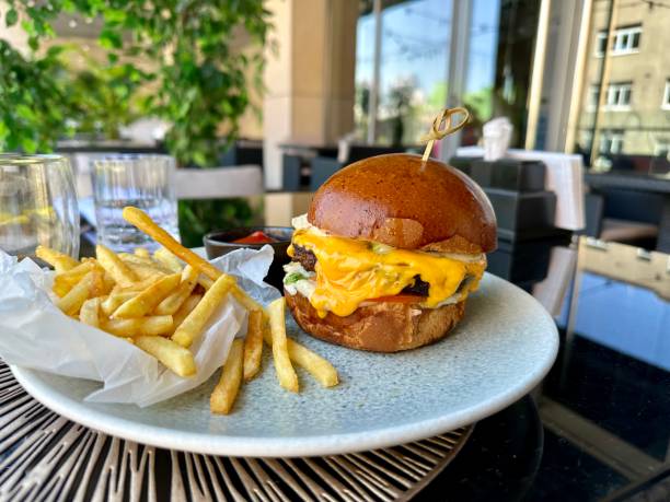 istock hamburger and fries in a plate outdoor 1756082526