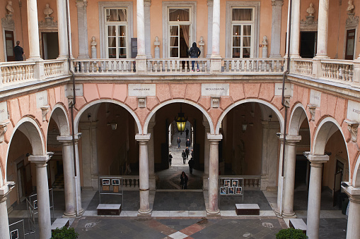 Genoa, Italy - 3 May,2019: The inner courtyard of Palazzo Rosso situated in the street of Via Giuseppe Grimaldi in historic center of Genoa, Liguria.