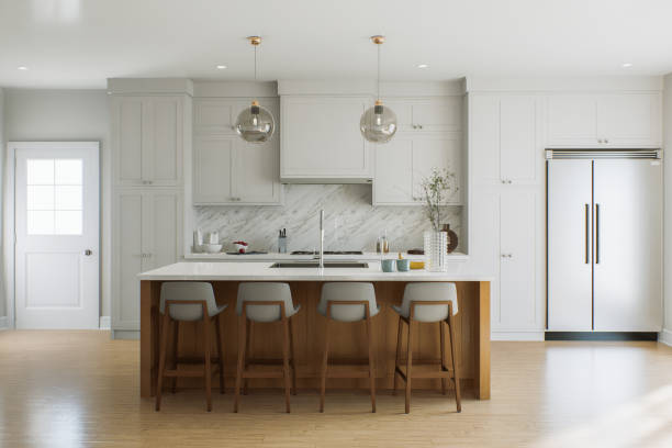 istock Bright kitchen with island and large double door refrigerator. White kitchen interior with household appliances. 3D rendering 1756096905