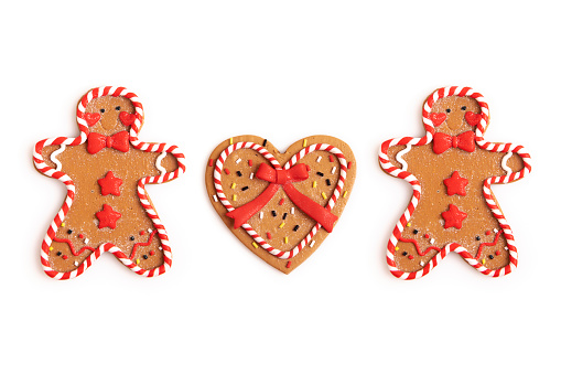 Gingerbread cookies on white background. Snowflake, star, man, angel, candy shapes.