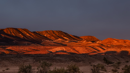 Desert Mountains bathed in early Dawn Sunrise