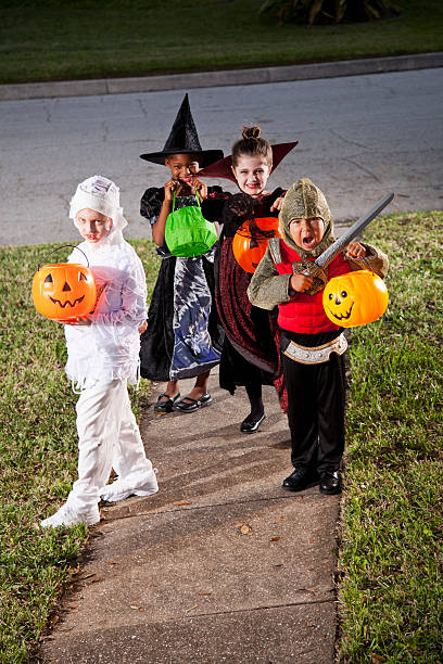 istock Children in halloween costumes 175612605