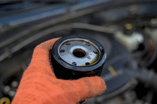 istock An auto mechanic shows an old, dirty oil filter 1756144952