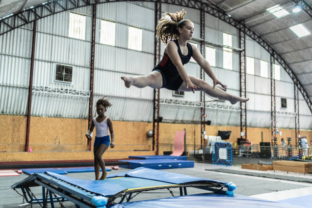 Girl jumping in a gymnasium