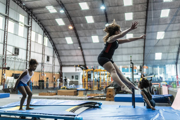istock Girl jumping in a gymnasium 1756154773