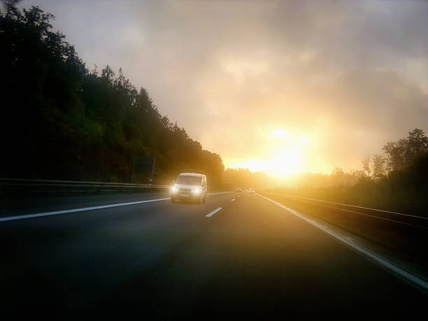 istock car in morning light on highway 175616853