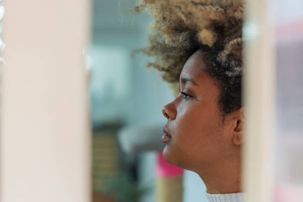 istock afro latin woman is at home with a sad face while she is alone 1756175417