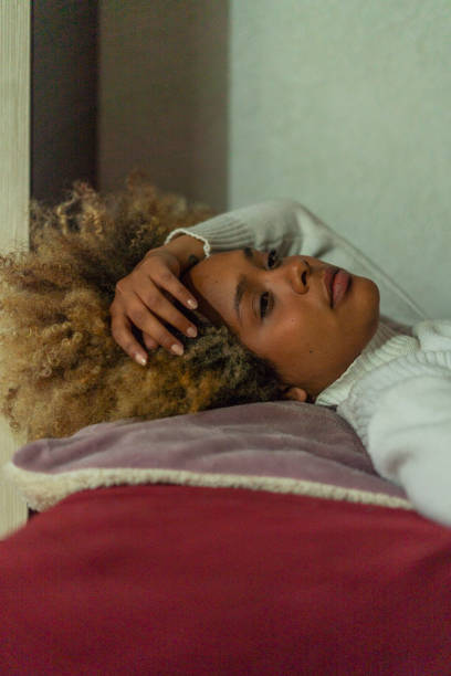 istock afro latin woman is at home with a sad face while she is alone 1756181537
