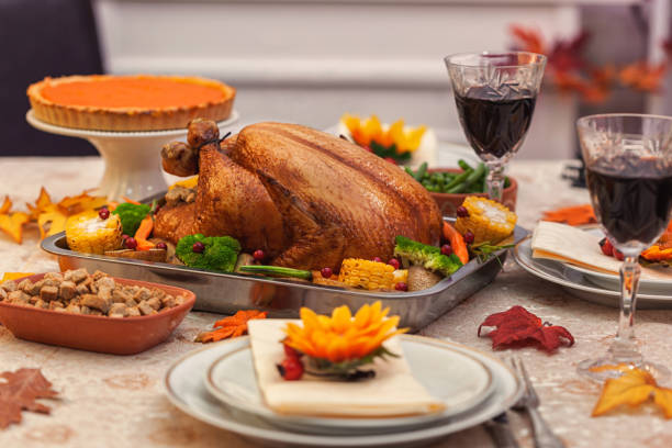 Traditional stuffed Thanksgiving turkey with side dishes