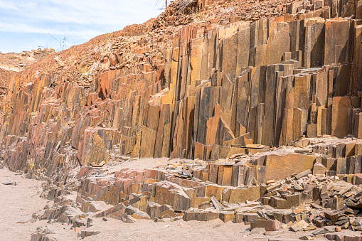 Basalt, volcanic rocks known as the Organ Pipes, Twyfelfontein in Damaraland, Namibia.  Horizontal.