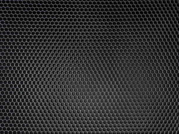 istock Background composing of black metallic honeycombs 1756187185