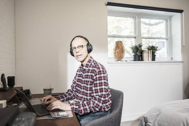 istock Senior man working at the desk in the morning 1756188366