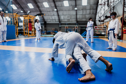 Boys training in a judo class at the gym