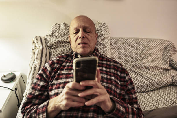 istock Senior man reading in the evening 1756190073