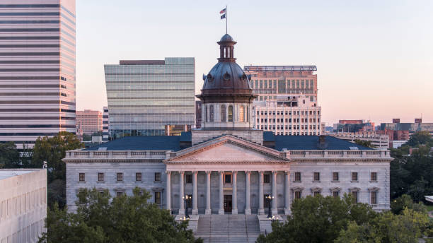 South Carolina State House in sunrise lights on Main Street of Downtown Columbia, SC stock photo