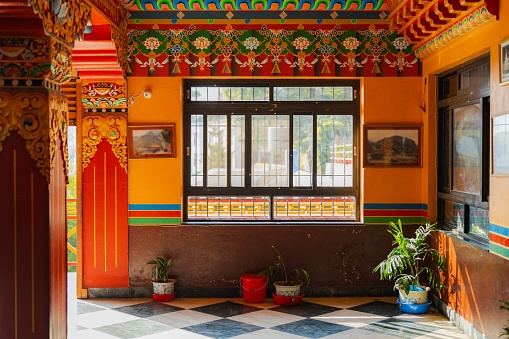 Interior of Tibetan monastery in orange colors, Nepal