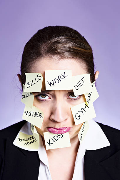 istock Fed up businesswoman pouts over quantity of commitments she has 175621303