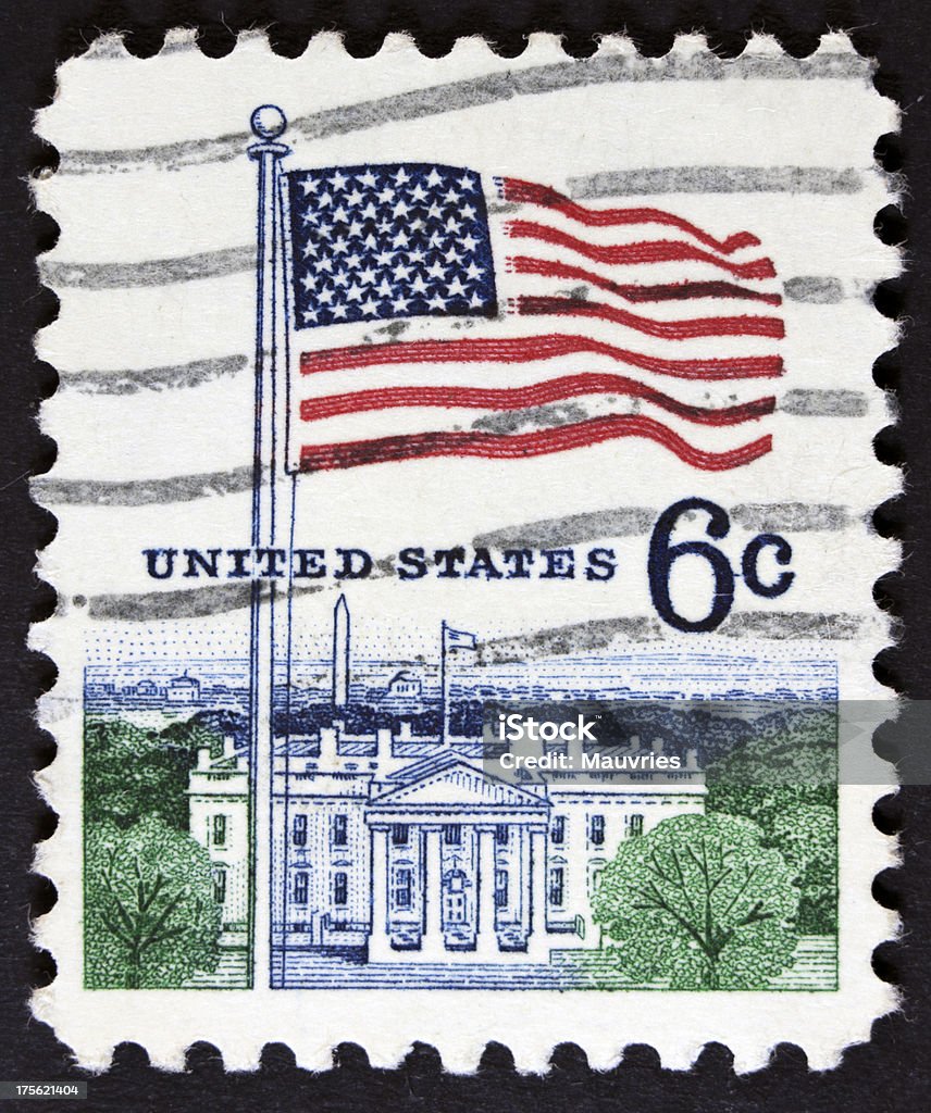 USA flag postage stamp UNITED STATES - CIRCA 1967 stamp printed in United states (USA), shows image of White House and American Flag, from series Flag Issue, circa 1967 Abstract Stock Photo