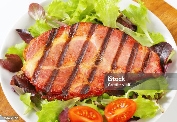 Grilled Pork With Salad Greens Stock Photo - Download Image Now - Barbecue - Meal, Close-up, Cooked