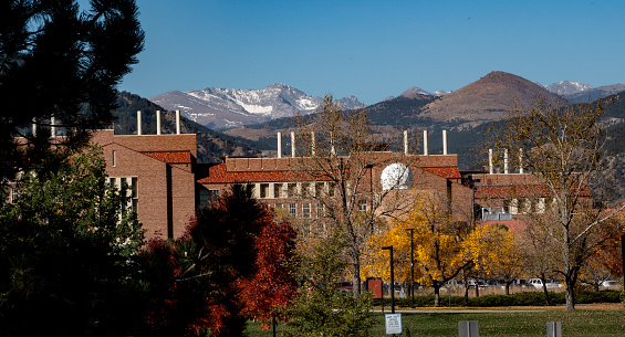 Boulder, Colorado, USA- October 23, 2023:Jennie Smoly Caruthers biotech building on the east campus of the University of Colorado, Boulder. Arapaho Peak in the distance.