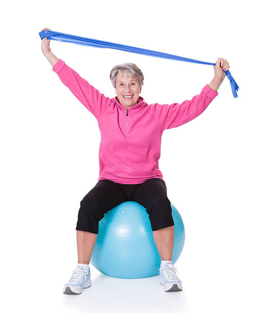 istock Senior Woman Stretching Exercising Equipment 175622513