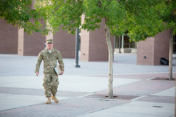 istock American Soldier with books 175623456
