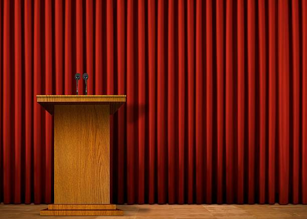 istock Empty press conference stage with podium and red curtain 175623546