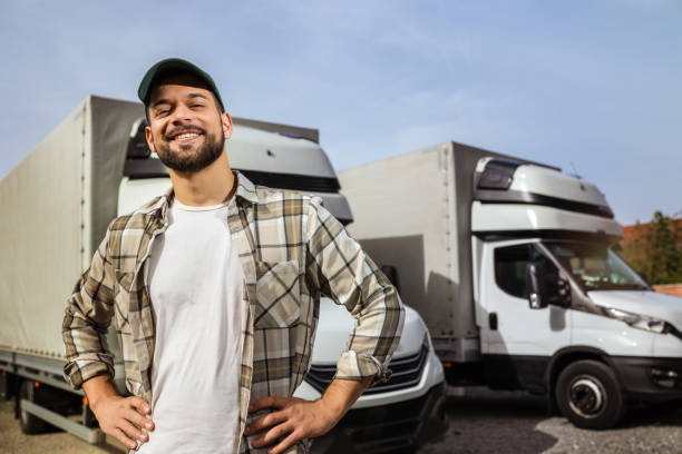 istock Happy confident male driver standing in front on his truck 1756240627