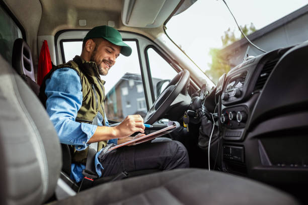 istock Young handsome man working in towing service and driving his truck. 1756244708