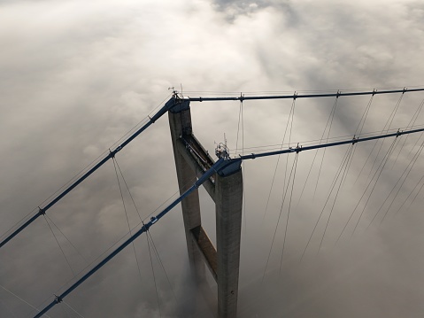 The Humber Bridge, near Kingston upon Hull, East Riding of Yorkshire, England, is a 2.22 km single-span road suspension bridge spanning the humber estuary  and  opened to traffic on 24 June 1981