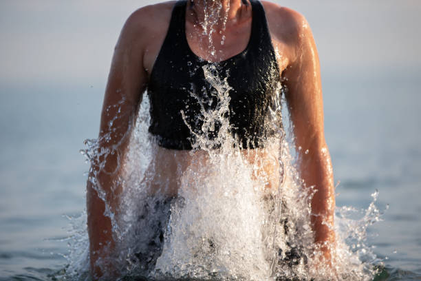istock Jump out of the water with streaming splashes. 1756249068