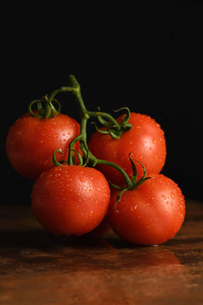 istock Fresh ripe red tomatoes branch 1756262297