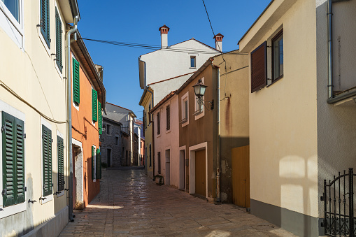 Street of Rovinj with calm, colorful building facades, Istria, Rovinj is a tourist destination on Adriatic coast of Croatia.