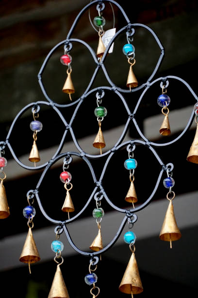istock handmade decoration, hanging bells on a rope 1756274516