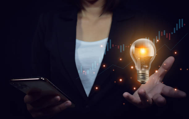 istock business holding light bulbs, ideas of new ideas with innovative technology and creativity. concept creativity with bulbs that shine glitter. 1756276701