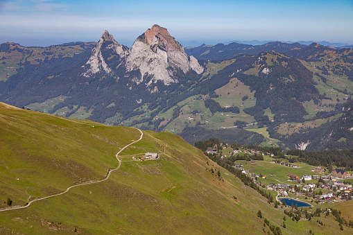 High angle view of the valley of Stoos with mountains Grosser Mythen and Kleiner Mythen in the background, Schwyz,  Switzerland