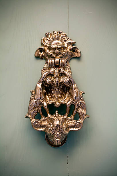 istock Brass ornate door knocker 175632886