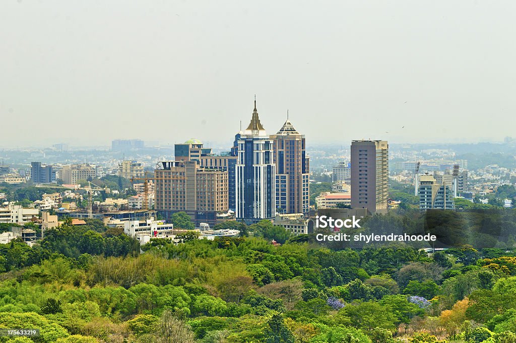 Bangalore or bengalurucity scape with green trees on foreground Bangalore city scape with trees in foreground Bangalore Stock Photo