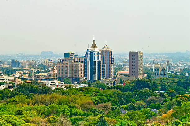 Bangalore or bengalurucity scape with green trees on foreground stock photo