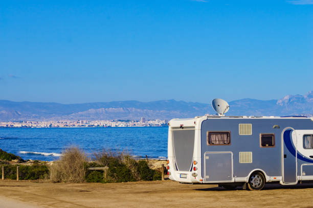 istock Satellite dish on roof of caravan 1756332548