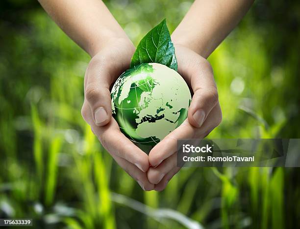 Green World In The Heart Hand Stock Photo - Download Image Now - Globe - Navigational Equipment, Planet Earth, Environmental Conservation