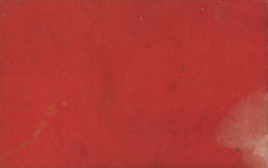 Close up of antique red paper texture full frame.