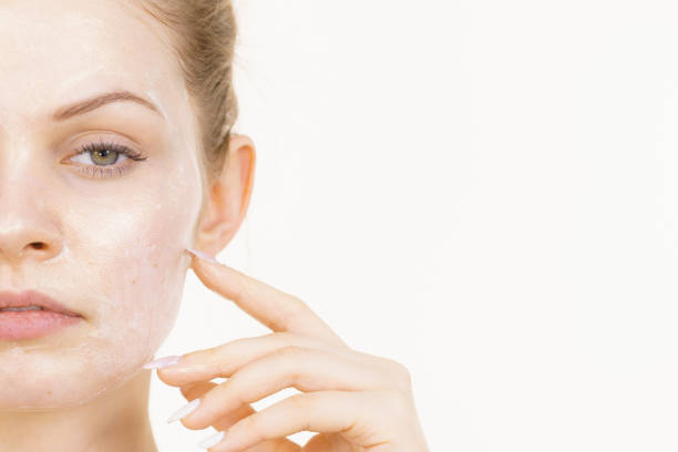 istock Girl with cream moisture cosmetic on face 1756348662