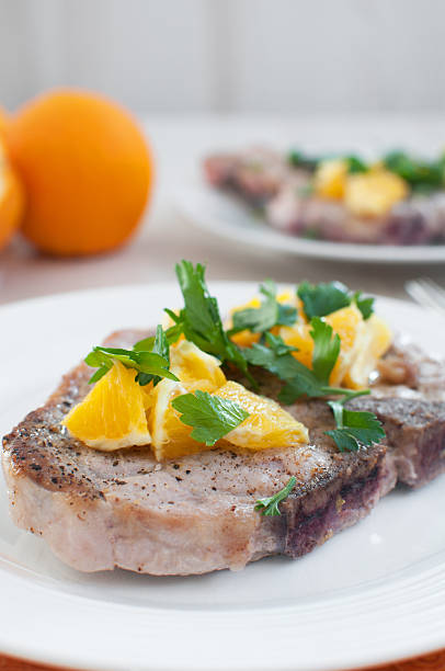 istock Meat steak with oranges and cilantro 175635295
